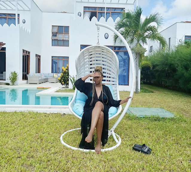 former Citizen TV presenter Janet Mbugua photo at the beach with Bikini