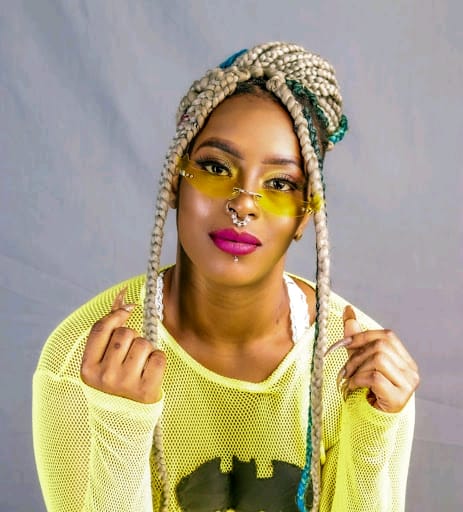 Socialite Manzi wa Kibera aka Wambuiphoto in her mud house
