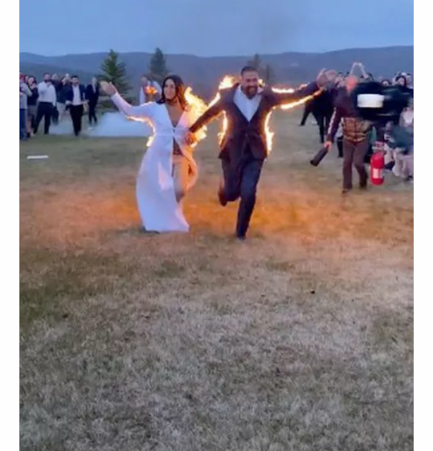 [PHOTOS] Bride and Groom set themselves on fire as stunt for their wedding day