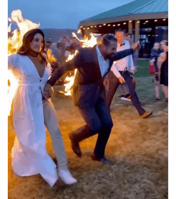[PHOTOS] Bride and Groom set themselves on fire as stunt for their wedding day