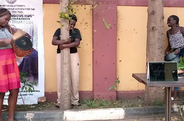 Faith Patricia Ariokot, 29, hugged a tree for 16 hours photos Faith Patricia Ariokot, 29, hugged a tree for 16 hours photos