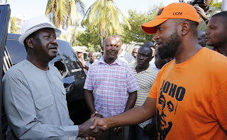 Hassan Joho with the ODM leader Raila Odinga at the Mombasa international airport. PHOTO | Courtesy 25/03/2017