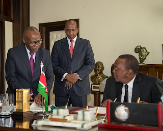 President Kenyatta signs the ant-torture law. PHOTO | Courtesy PSCU President Kenyatta signs the ant-torture law. PHOTO | Courtesy PSCU