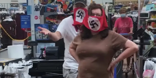 Minnesota wearing the swastikas on their faces