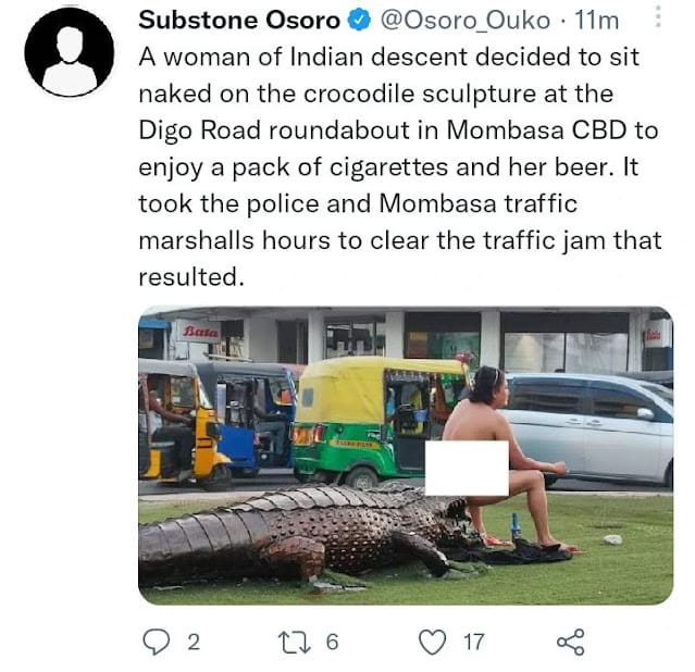 Mombasa traffic that caused by a lady sitting at crocodile sculpture without clothes Mombasa traffic that caused by a lady sitting at crocodile sculpture without clothes