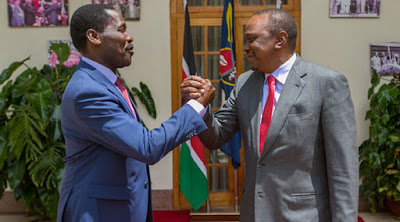 Peter Munya and President Uhuru Kenyatta. PHOTO | PSCU Peter Munya and President Uhuru Kenyatta. PHOTO | PSCU