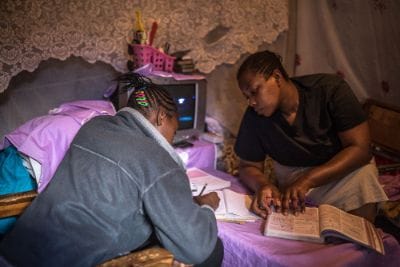 Parents help children in CBC