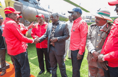 Isaac Ruto with Uhuru Kenyatta. PHOTO | PSCU Isaac Ruto with Uhuru Kenyatta. PHOTO | PSCU