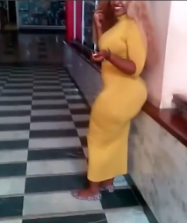 A Kisumu mall stand still watching a socialite booty as she enters for shopping.