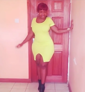 A Kisumu mall stand still watching a socialite booty as she enters for shopping.
