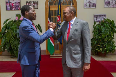 Peter Munya with the President Uhuru Kenyatta. PHOTO | PSCU