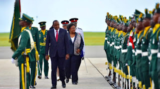 President Uhuru Kenyatta in Bridgetown Barbados welcomed by Prime Minister Mia Mottley. PHOTO | PSC Republic of Barbados – President Uhuru Kenyatta arrives in Barbados, received by Prime Minister Mia Mottley at Bridgetown