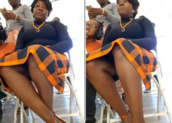 Church woman trending for live video while pastor preaching photo